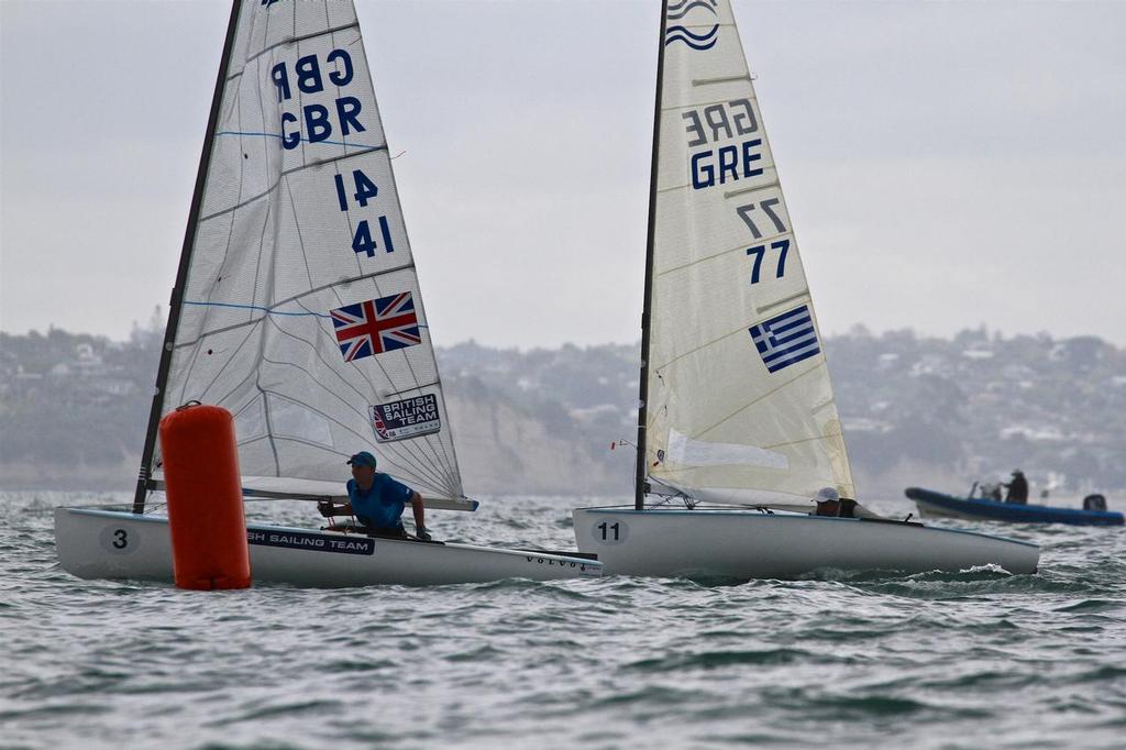Giles Scott (GBR) and Ioannis Mitakis (GRE) simo-gybe at the final mark of Race 3 - 2015 Finn Gold Cup © Richard Gladwell www.photosport.co.nz